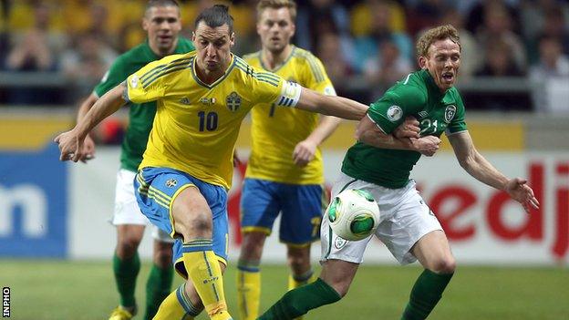 Zlatan Ibrahimovic battles with Paul Green in Stockholm