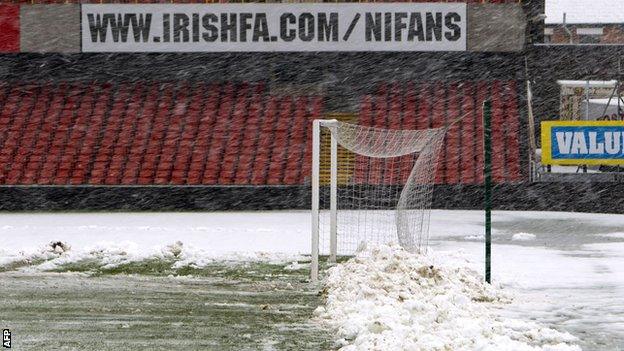 Snow was cleared from the Windsor Park pitch on Friday