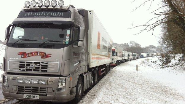 A train of lorries stuck on the A75 at Newton Stewart