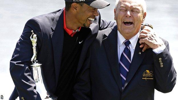 World number one Tiger Woods (left) with tournament host Arnold Palmer