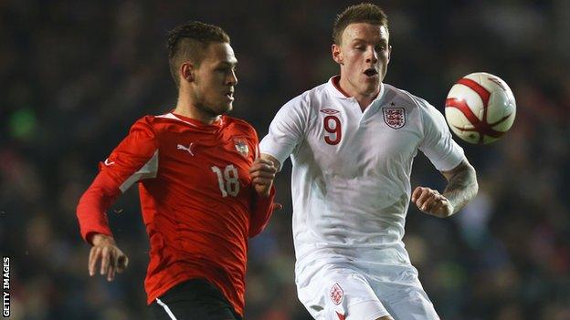 England Under-21 international Connor Wickham challenges Austria's Lukas Spendlhofer