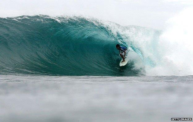 Surfer off the Philippines coast