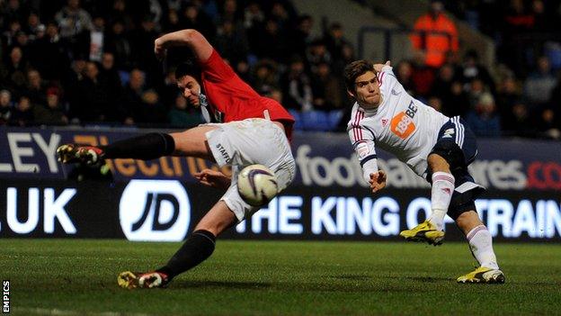 Marcos Alonso shoots at goal