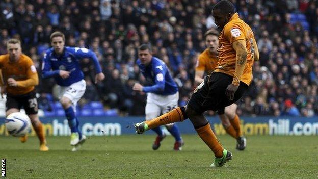 Sylvan Ebanks-Blake tucks away Wolves' third goal at St Andrew's on Monday from the penalty spot