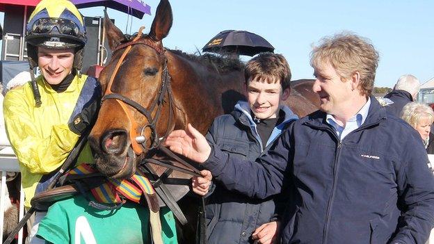 Pineau De Re rode by Danny Mullins after the race with trainer Philip Fenton (right)