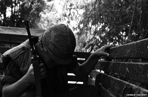 Soldier with bowed head