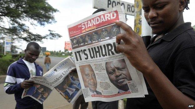 Nairobi resident read on 31 March 2013 in Nairobi the newspaper with the headline of Kenyan fourth president Uhuru Kenyatta's win, following the supreme court's decision that he was duly elected