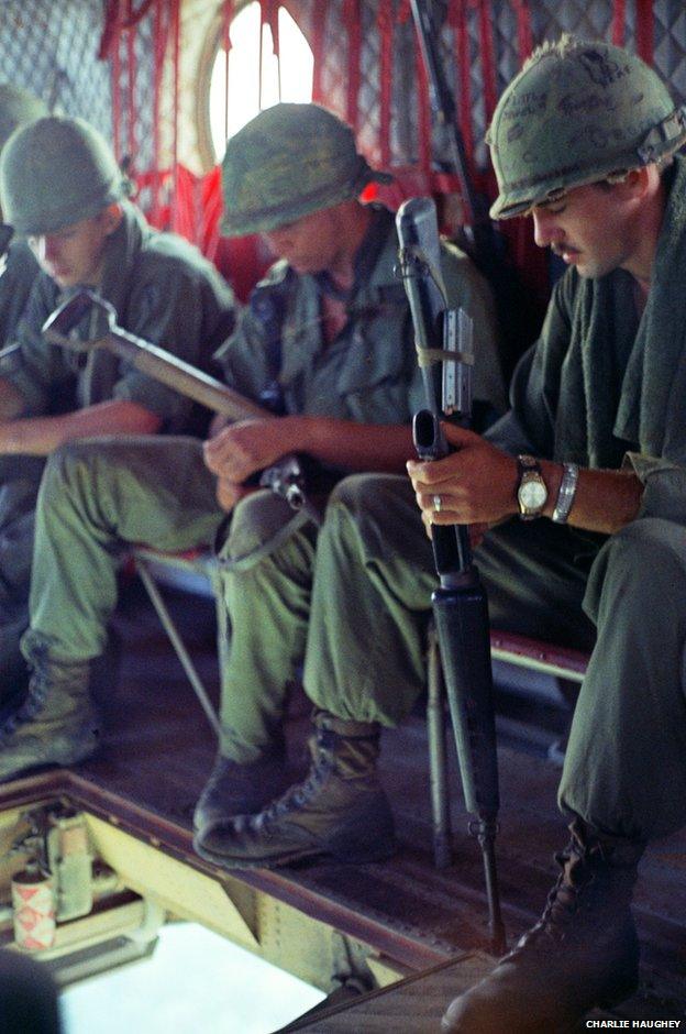 Soldiers aboard an airborne Chinook