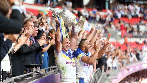 Warrington Wolves captain Adrian Morley lifts the 2012 Challenge Cup