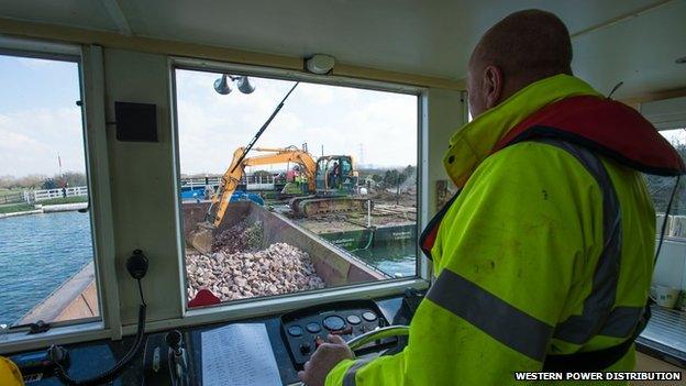 View from the boat which is delivering materials to the building site