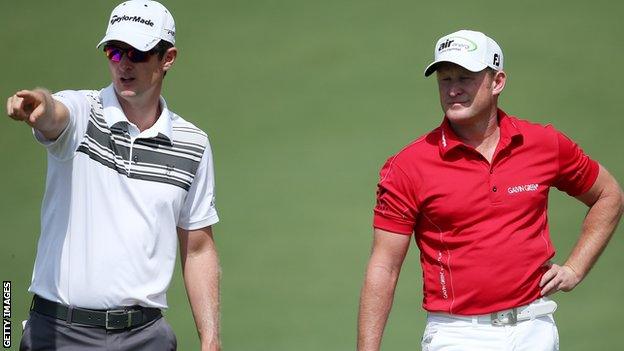 Jamie Donaldson (right) receives some guidance at Augusta from Justin Rose