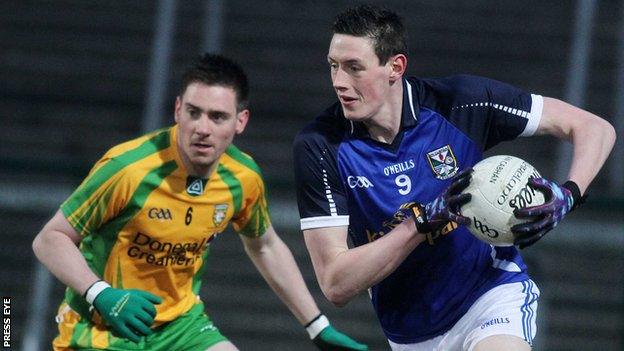 Cavan's Michael Argue tries to burst away from Donegal's Martin O'Reilly