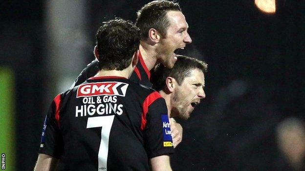 Rory Patterson (right) celebrates after scoring his second penalty