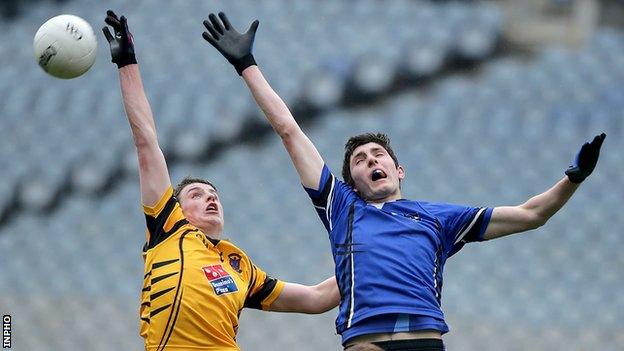 Maghera's Peter Cassidy battles with Navan's Donal Ryan