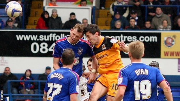 Hull midfielder Robert Koren heads in his side's winner against Ipswich