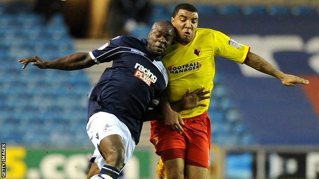 Danny Shittu and Troy Deeney