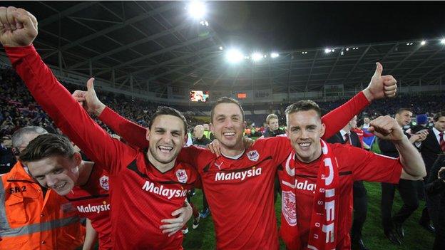 Cardiff players celebrate winning promotion