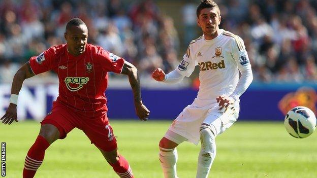 Southampton's Nathaniel Clyne and Swansea's Pablo Hernandez