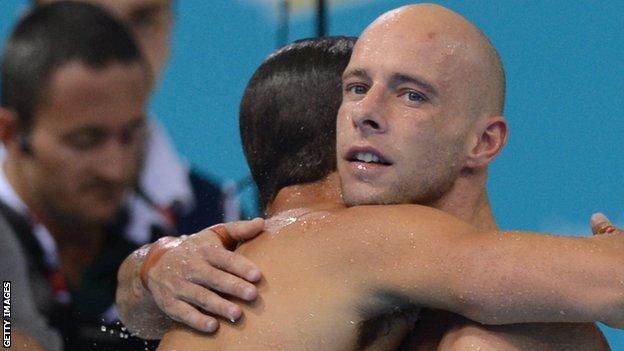 Tom Daley hugs Peter Waterfield