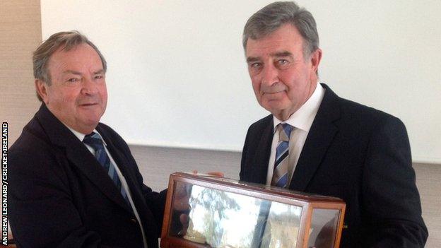 Outgoing Cricket Ireland president Arthur Vincent with new president Robin Walsh