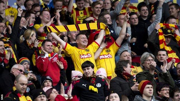 Partick Thistle fans celebrate winning the First Division title