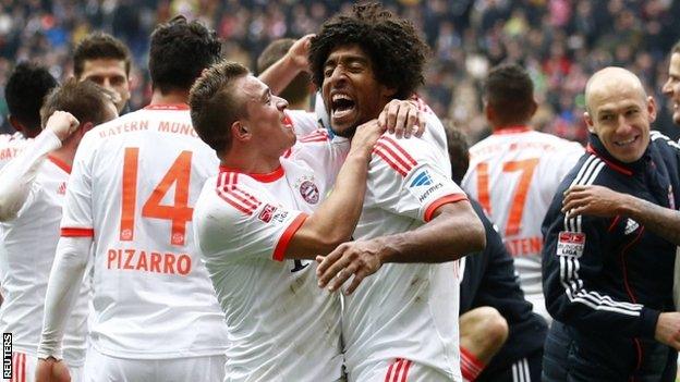 Bayern Munich celebrate winning the Bundesliga title