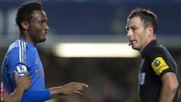 Mark Clattenburg and John Mikel Obi