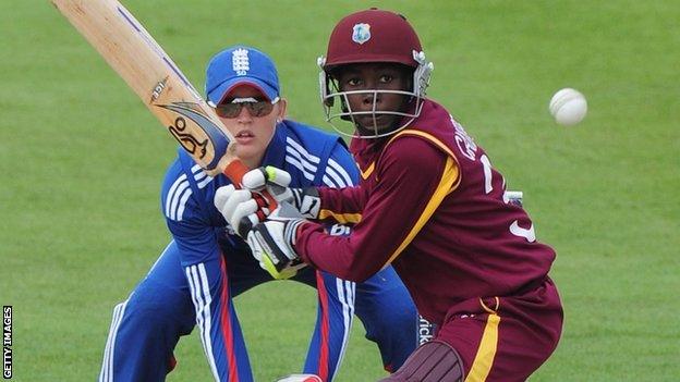 West Indies' Shemaine Campbelle hits out, watched by England keeper Sarah Taylor