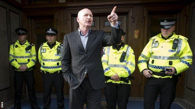 John Brown addresses Rangers fans at the main door at Ibrox last July