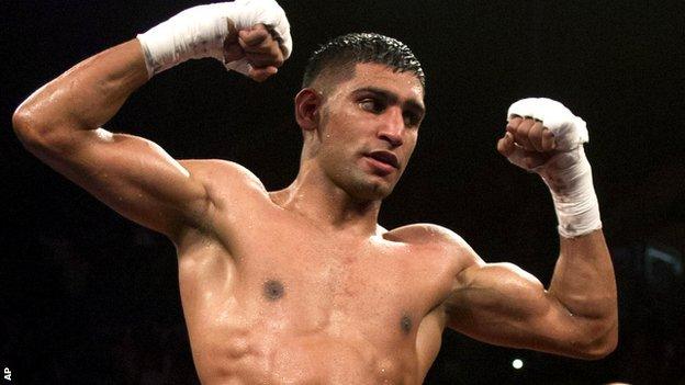 Amir Khan celebrates