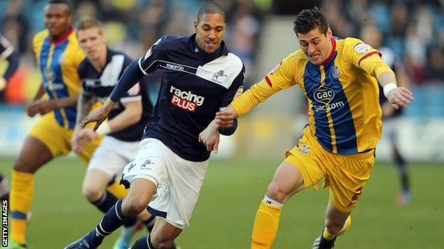 Shaun Batt of Millwall challenges Joel Ward of Crystal Palace