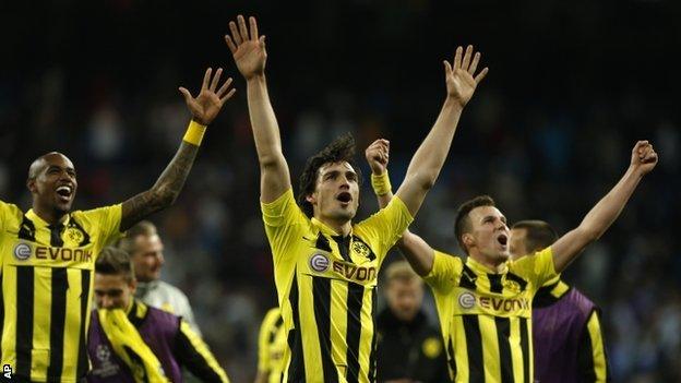 Dortmund's players celebrate at the final whistle