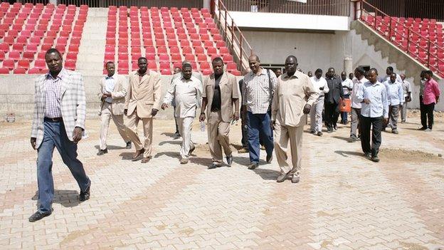 Cecafa Secretary General Nicholas Musonye (centre) inspects one of the stadiums that will host the Cecafa Club Championship in June