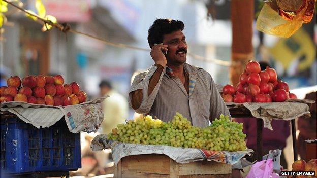 Man speaks on his mobile phone