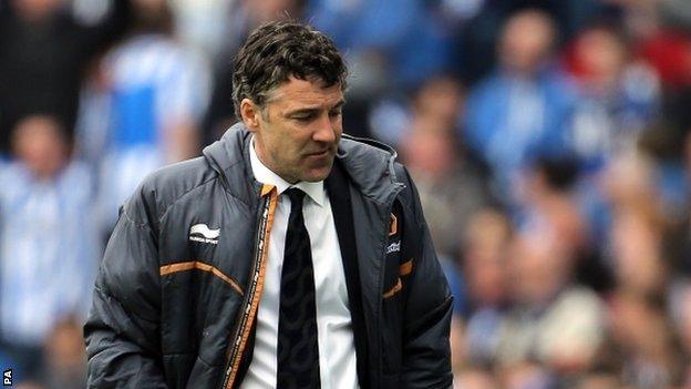 Dejected Wolves boss Dean Saunders