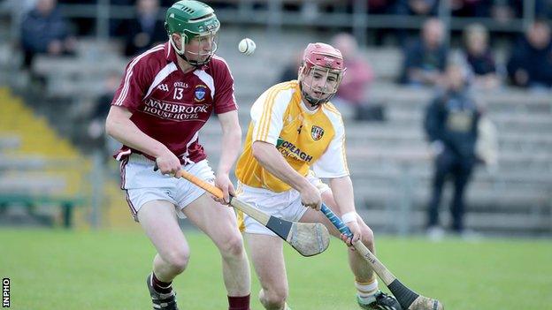 Westmeath's Niall O'Brien with Mark McFadden of Antrim