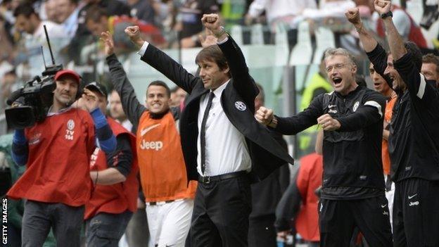 Juventus coach Antonio Conte celebrates his side's title triumph