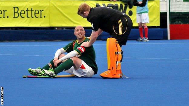 Guernsey skipper Matt Watson is consoled after the loss