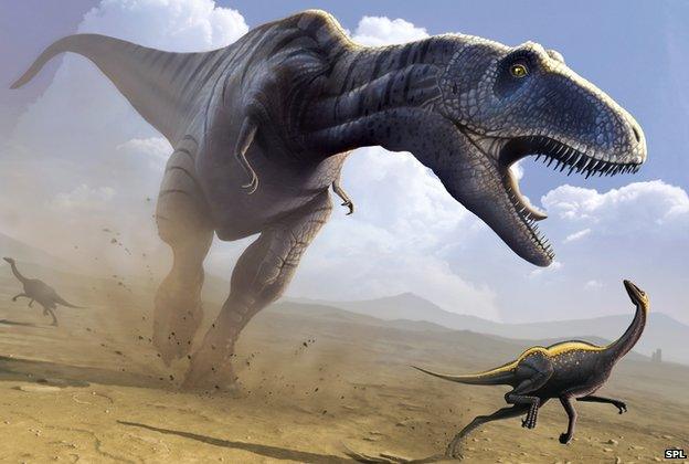 An artist's impression of a Tyrannosaurus rex hunting a smaller dinosaur