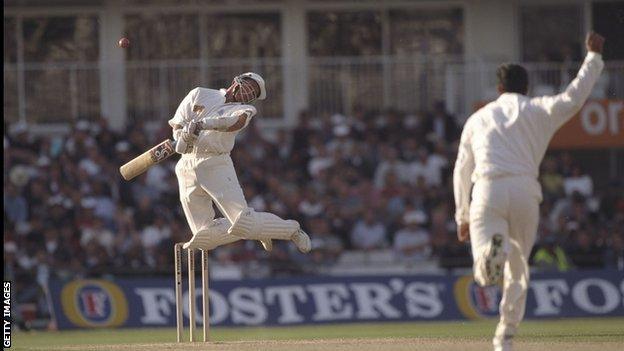 Alec Stewart avoids a Wasim Akram bouncer