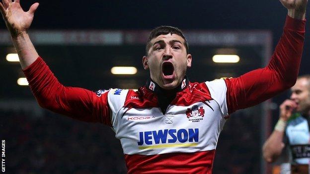 Jonny May celebrates scoring a try