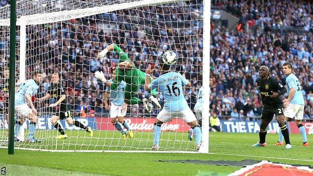 Ben Watson scores for Wigan against Manchester City in the FA Cup final