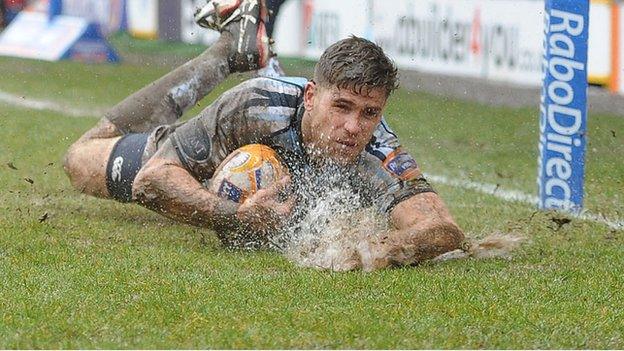 Gavin Evans causes a big splash as he scores a try for Cardiff Blues at Cardiff Arms Park