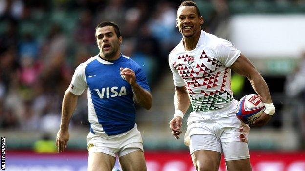 England wing Dan Norton races away to score against Argentina