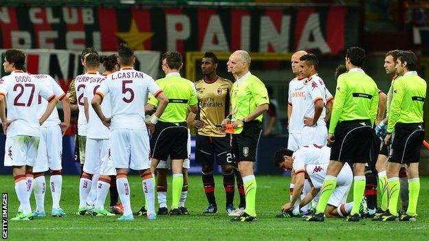 Serie A match between AC Milan and Roma halted because of racist chanting