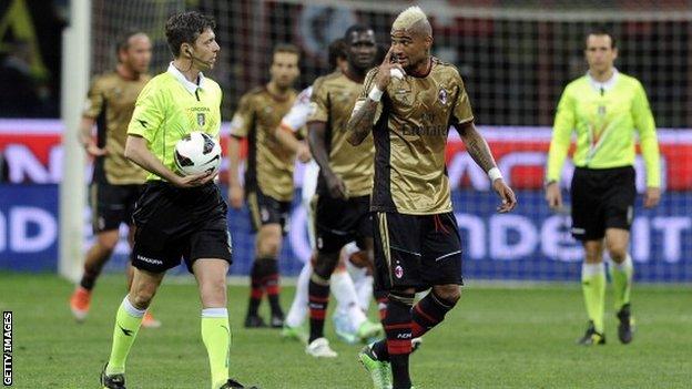 AC Milan's Kevin Prince Boateng and referee Gianluca Rocchi speak during the Serie A match between Milan and Roma