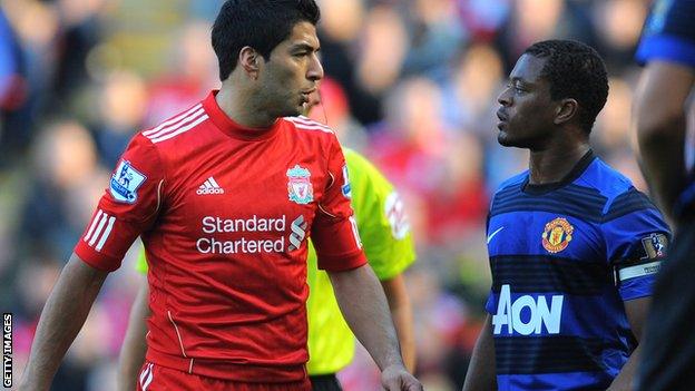 Luis Suarez and Patrice Evra