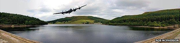 Lancaster Bomber in a memorial run over Ladybower reservoir