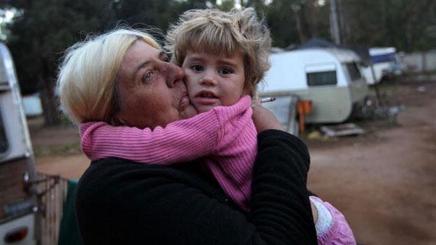 Woman and child at Krugersdorp squatter camp, June 2010