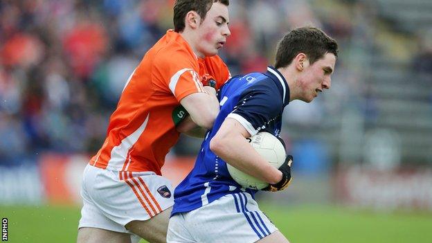 Niall Clerkin battles with Conor Martin in the minor clash at Breffni Park